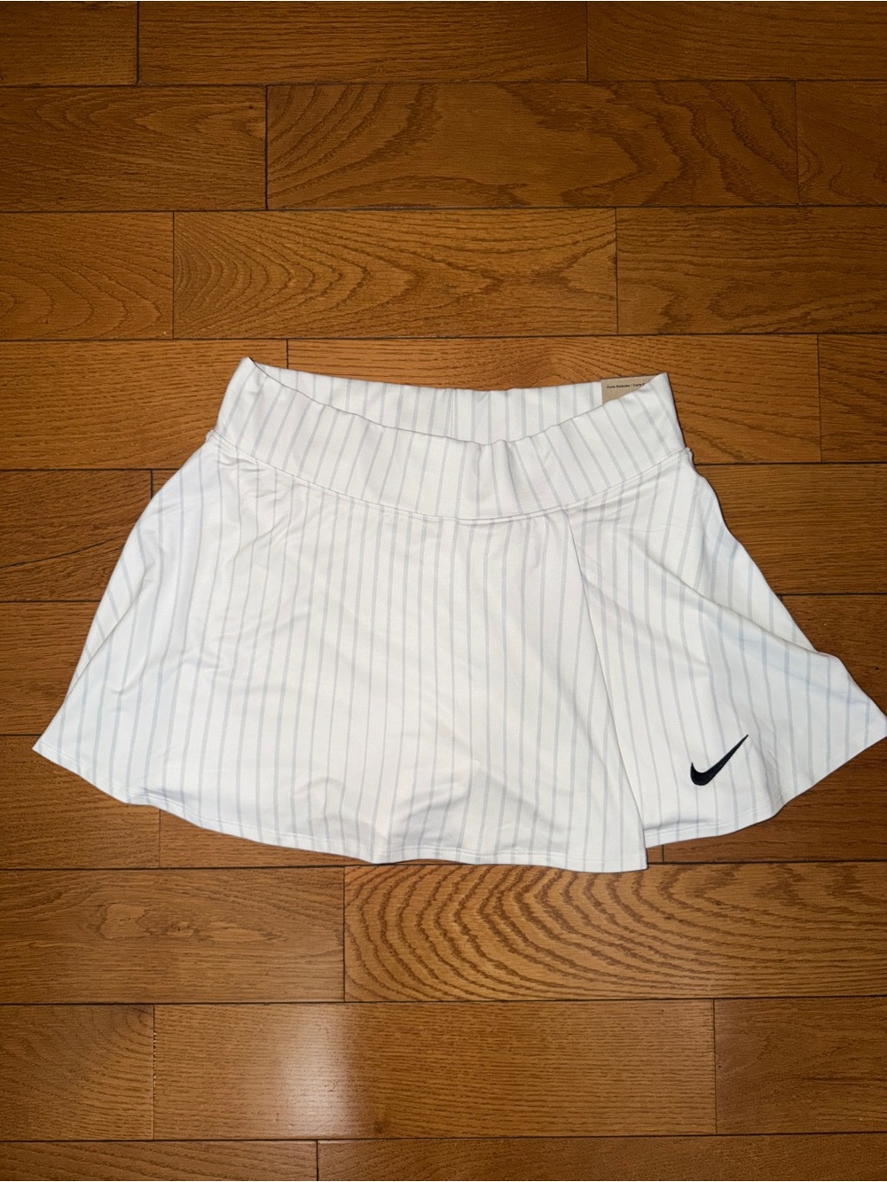 Nike White Pinstriped Skater Skirt with Black Swoosh Logo